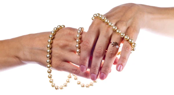 Female hands with a pearl — Stock Photo, Image