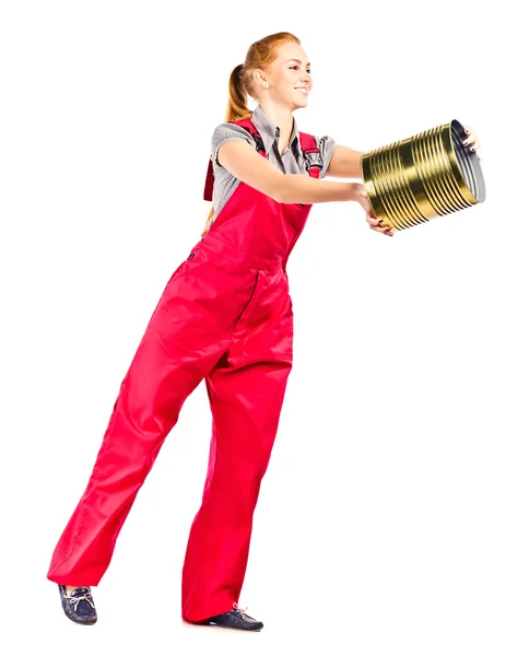 Young woman in red overalls with painting tools — Stock Photo, Image