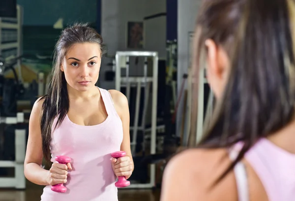 Girl in sport hall — Stock Photo, Image