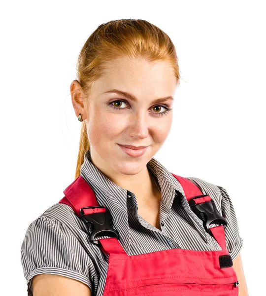 Young happy woman in red overalls — Stock Photo, Image