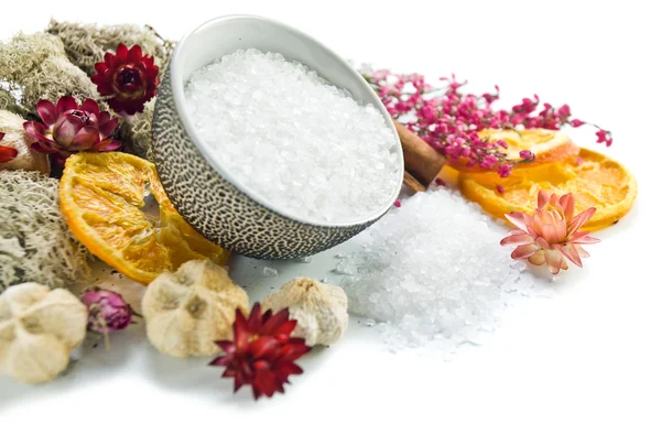 Sea salt with dried fruits, plants and flowers — Stock Photo, Image