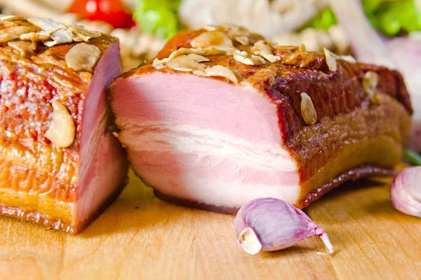Smoked meat with garlic — Stock Photo, Image