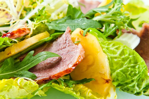 Salad with pineapple and smoked meat — Stock Photo, Image