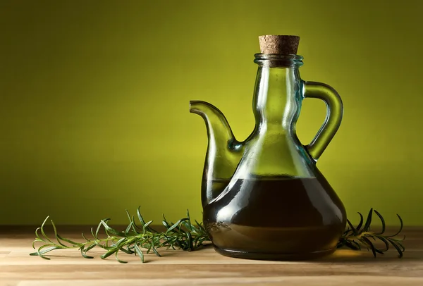 Jug with olive oil — Stock Photo, Image