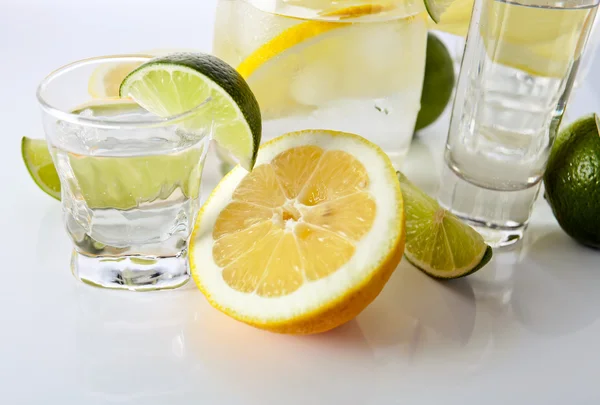 Drinks with lemon and lime — Stock Photo, Image