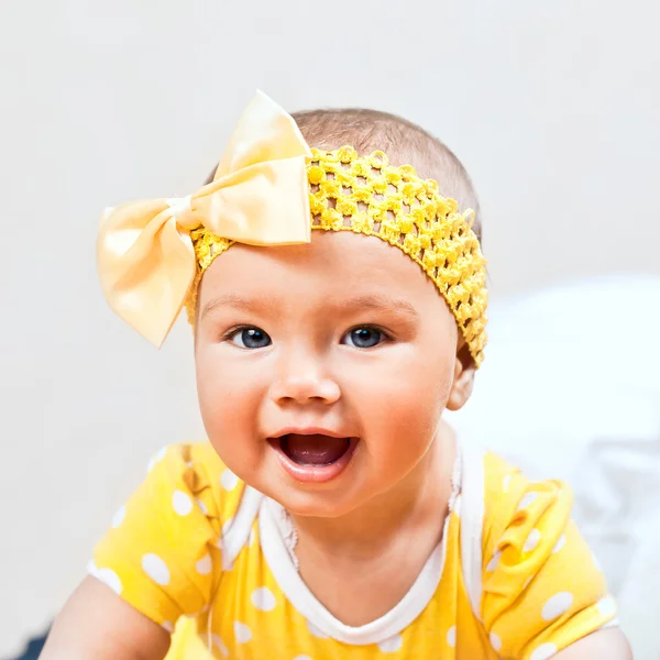 Little girl in yellow — Stock Photo, Image