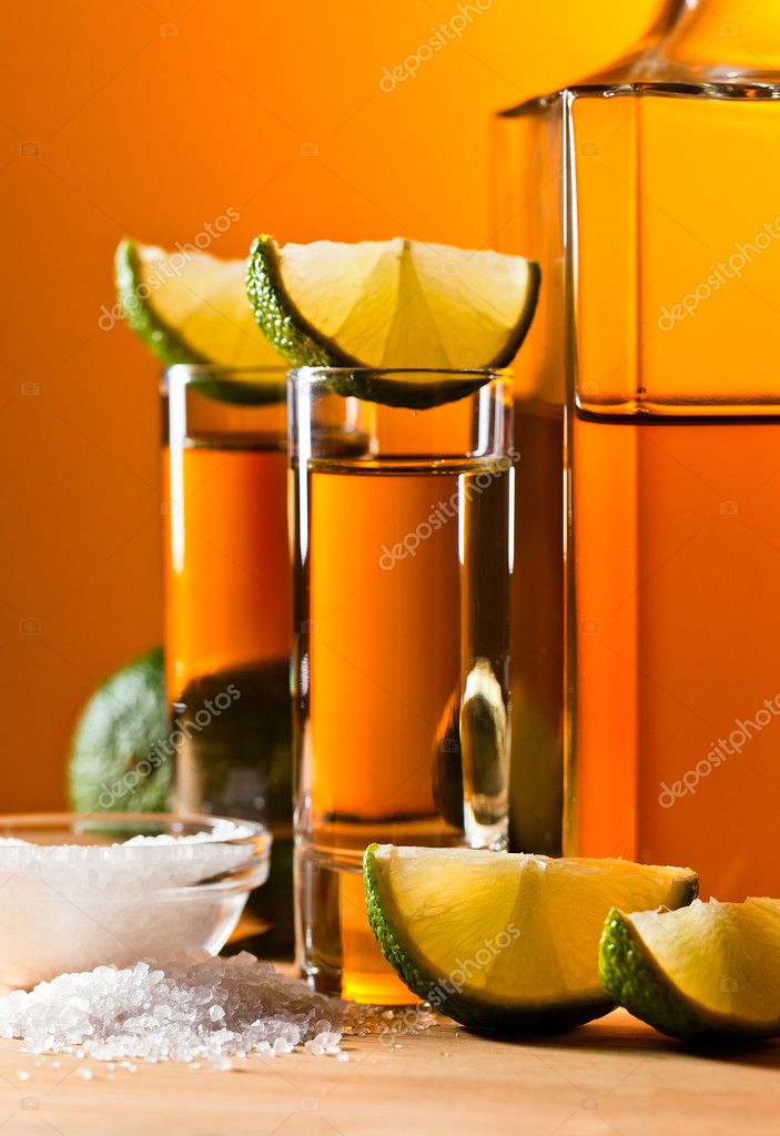 Gold tequila with salt and lime Stock Photo by ©igorr1 48000747