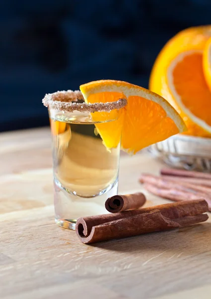 Tequila with orange and cinnamon — Stock Photo, Image