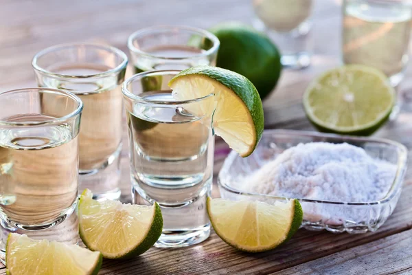 Gold tequila with salt and lime — Stock Photo, Image