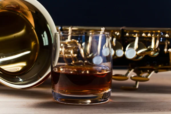 Saxophone and whiskey — Stock Photo, Image