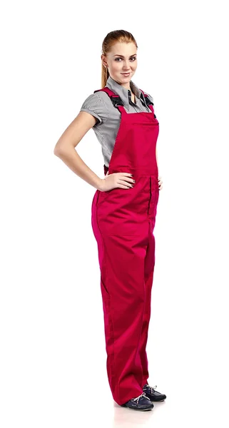 Frau in roten Overalls, isoliert auf weißem Grund — Stockfoto