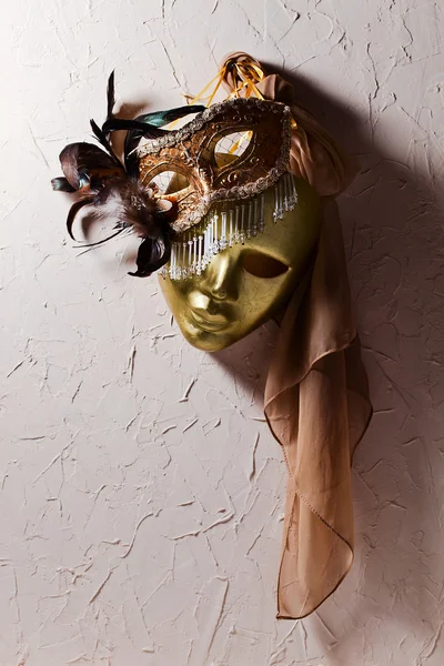 Venetian masks on  old wall — Stock Photo, Image