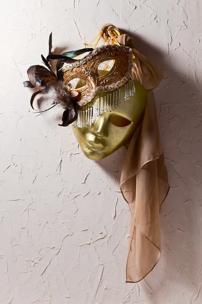 Venetian masks on  old wall — Stock Photo, Image