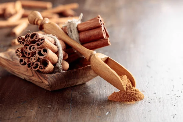 Cinnamon Sticks Wooden Spoon Powder Old Wooden Table Copy Space — Stock Photo, Image