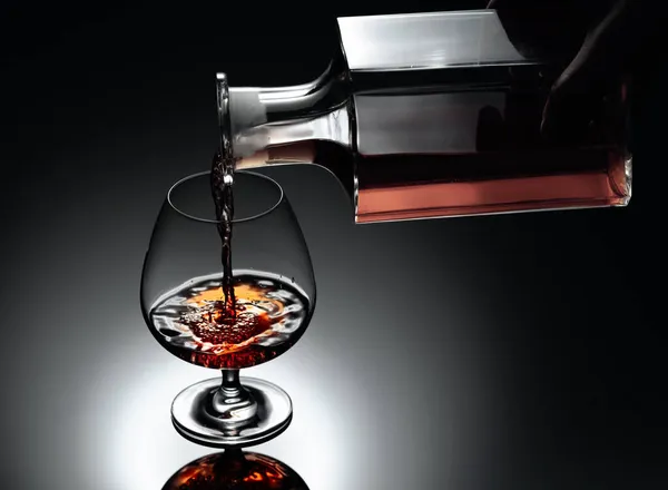 Brandy Poured Decanter Glass Black Reflective Background Copy Space — Stock Photo, Image