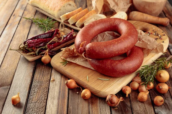 Smoked Sausage Rosemary Onion Pepper Sausage Bread Spices Old Wooden — Stock Photo, Image