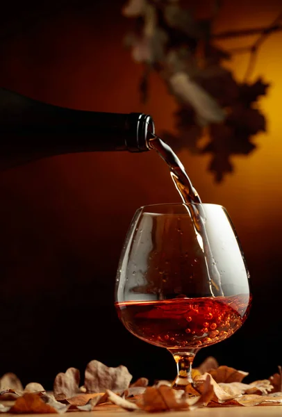 Cognac Poured Glass Bottle Snifter Brandy Old Oak Table Fallen — Stock Photo, Image