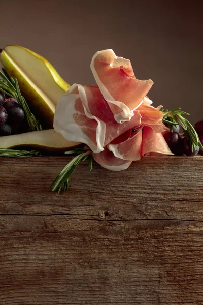 Prosciutto Rosemary Pear Grapes Old Wooden Table Copy Space — Stock Photo, Image