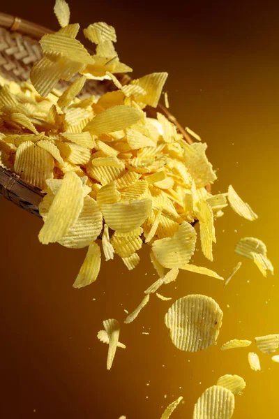 Falling Potato Chips Yellow Background Copy Space — Stock Photo, Image