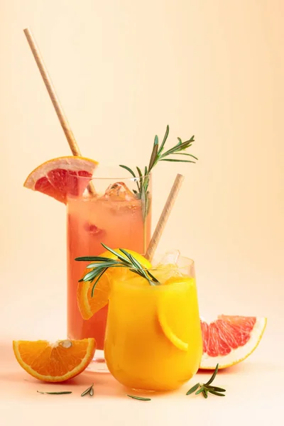 Orange Grapefruit Juice Glasses Rosemary Ice Copy Space — стоковое фото