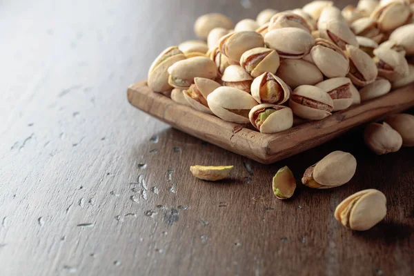 Salted Pistachios Dish Old Wooden Table Copy Space — Foto Stock
