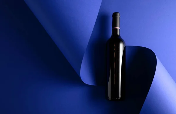 Bottle Red Wine Blue Background Copy Space Your Text Top — Stock fotografie