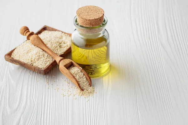 Sesame Seeds Oil White Wooden Table Copy Space — Stock Photo, Image