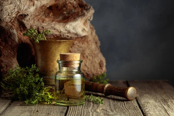 Bottle Thyme Essential Oil Fresh Thyme Twigs Old Wooden Table — Stock Photo, Image