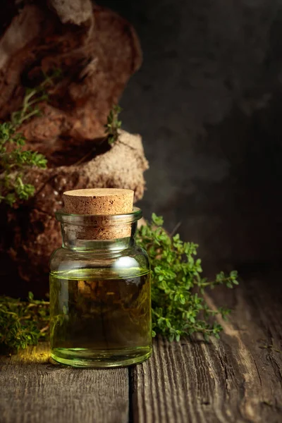 Bottle Thyme Essential Oil Fresh Thyme Twigs Old Wooden Table — Stock fotografie