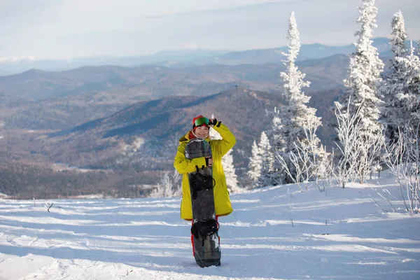 Mulher Snowboarder Roupas Esqui Posa Com Uma Placa Contra Fundo — Fotografia de Stock