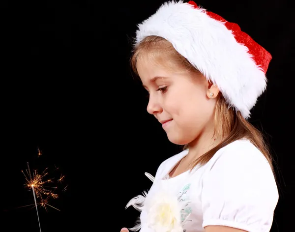 Meisje bedrijf sparkler — Stockfoto