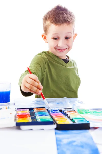 Casual schoolboy painting — Stock Photo, Image