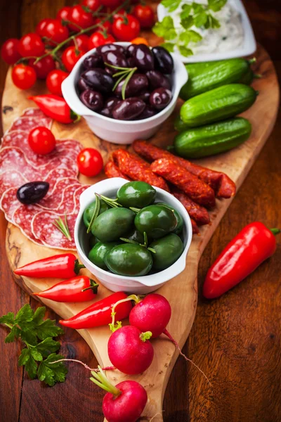 Raw snack with antipasti — Stock Photo, Image