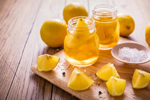Preserved Salted Canned Lemons Lemon Pickle Wooden Background Moroccan Cuisine — Foto Stock