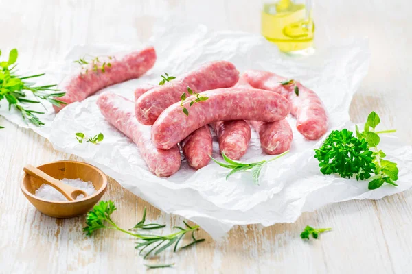 Raw Sausages Prepared Bbq Grill Herbs Onions — стоковое фото