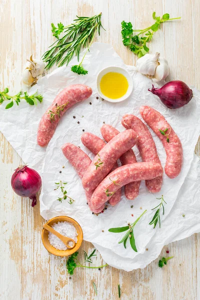 Raw Sausages Prepared Bbq Grill Herbs Onions — стоковое фото
