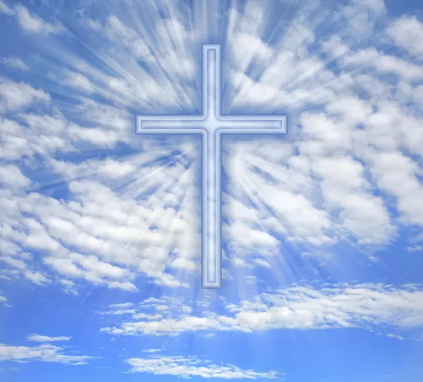 Christian cross with light beams over sky — Stock Photo, Image