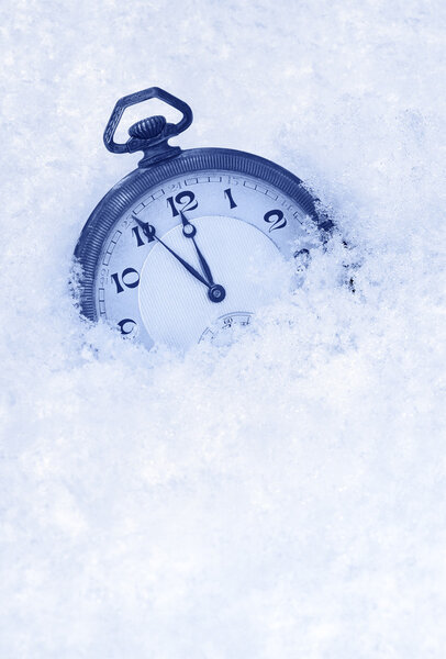 Pocket watch in snow, Happy New Year greeting card