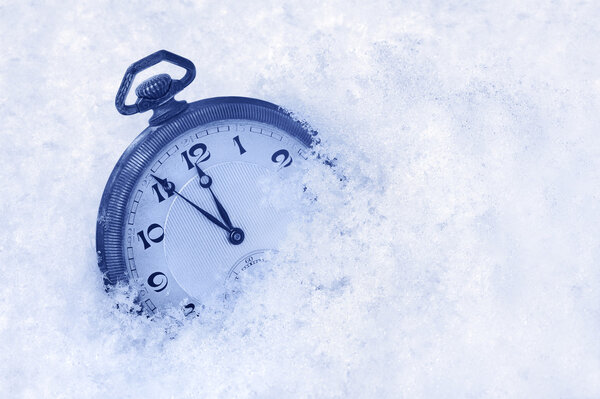 Pocket watch in snow, Happy New Year greeting card