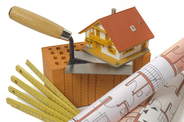 Baksteen en hulpmiddelen voor woningbouw — Stockfoto