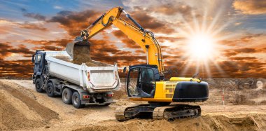 excavator is digging on construction site