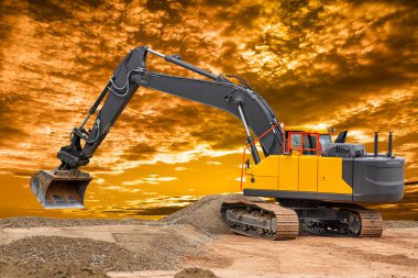 excavator is digging at construction site