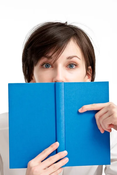 Frightened student girl with a book — Stock Photo, Image