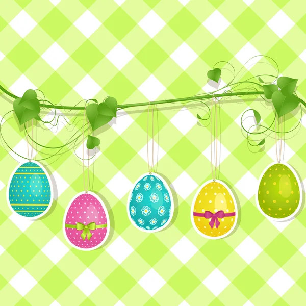 Hanging Easter egg background on green — Stock Vector