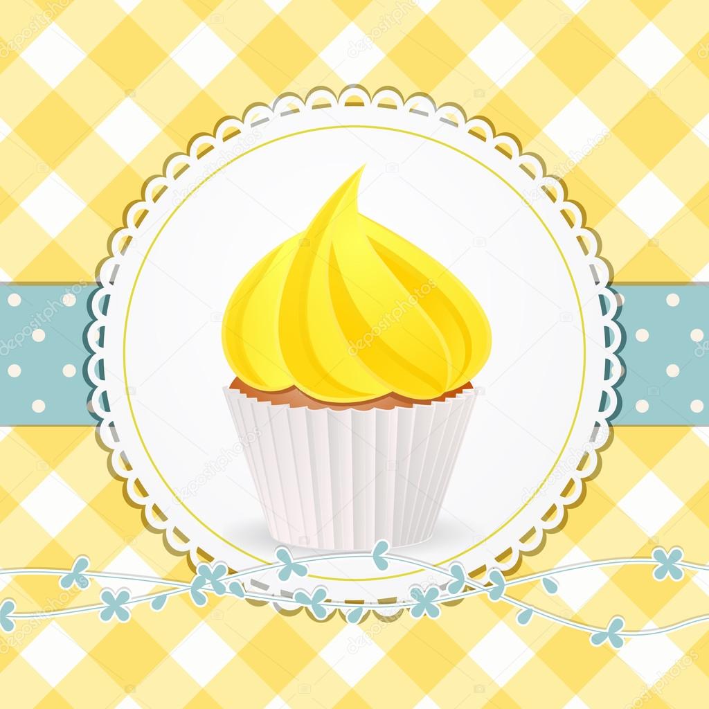 cupcake with yellow icing on yellow gingham background