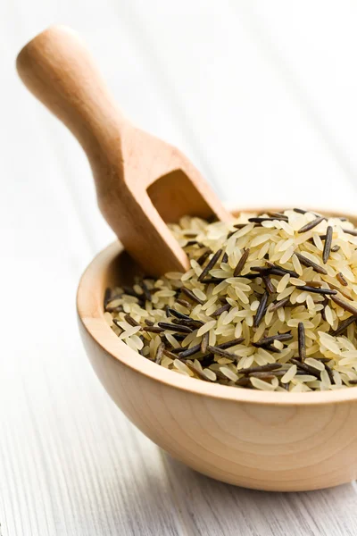 Wild rice in wooden bowl — Stock Photo, Image