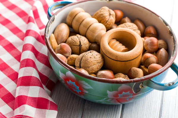 Wooden nutcracker and nuts — Stock Photo, Image