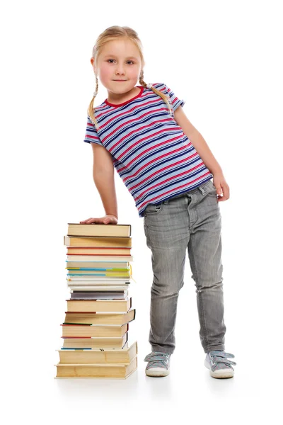 Meisje met een stapel boeken — Stockfoto