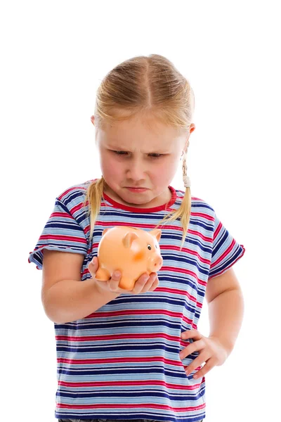 Kleines Mädchen mit Sparschwein — Stockfoto