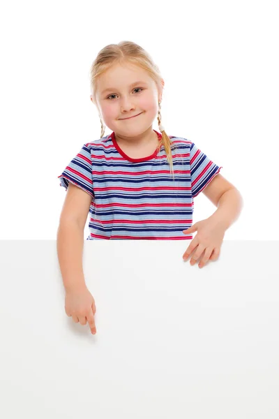 Menina apontando para quadro branco . — Fotografia de Stock